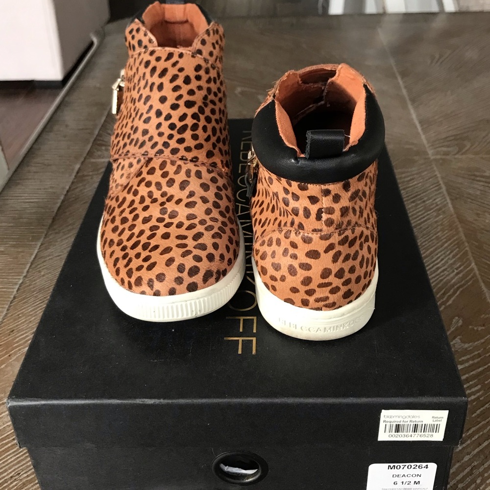 Rebecca Minkoff high-top leopard zip up sneakers.